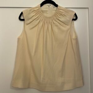 Chic Sleeveless Cream Blouse